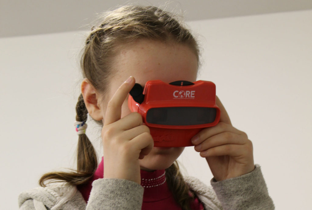 A young girl using using the coviewmaster