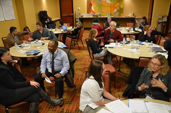 A group of CO providers collaborating together during a CORE workshop
