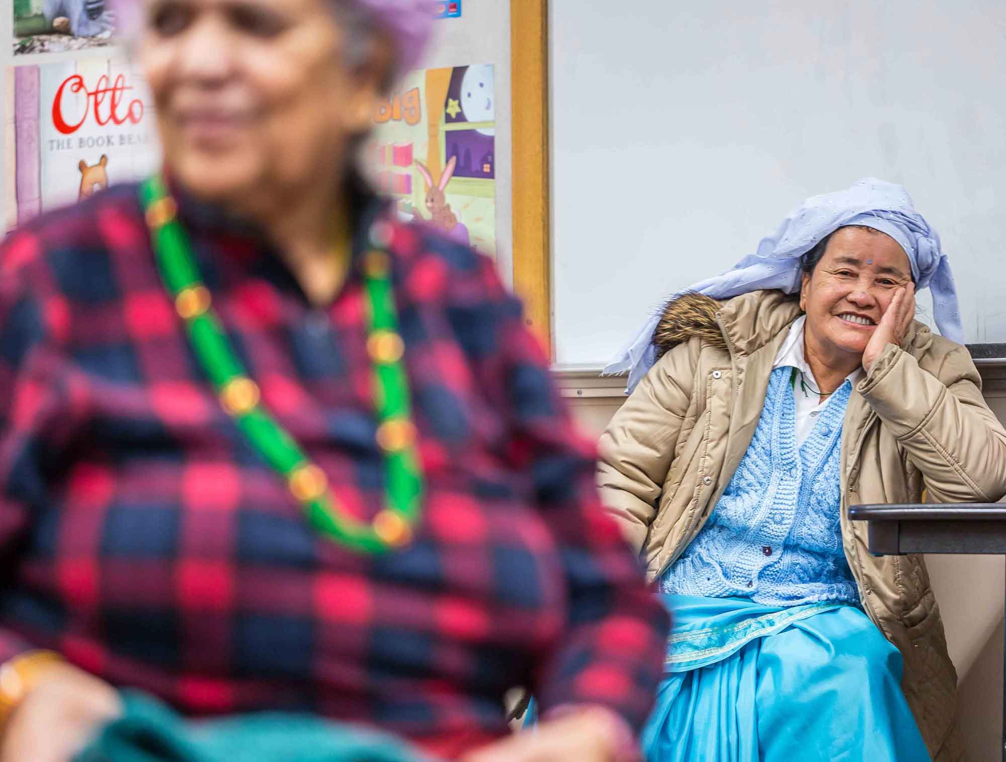 Bhutanese refugee women attending a local knitting group at their resettlement center.