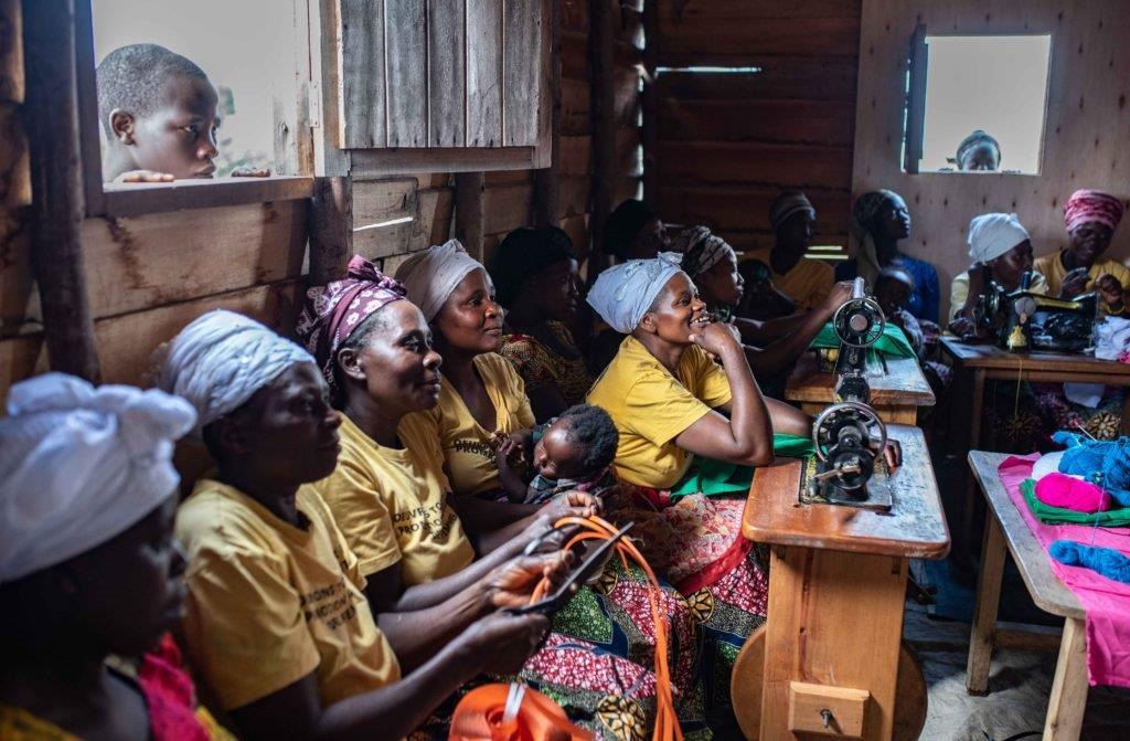 Congolese women knit in a community space where they take part in activities designed to support women and girls in Goma, DRC.