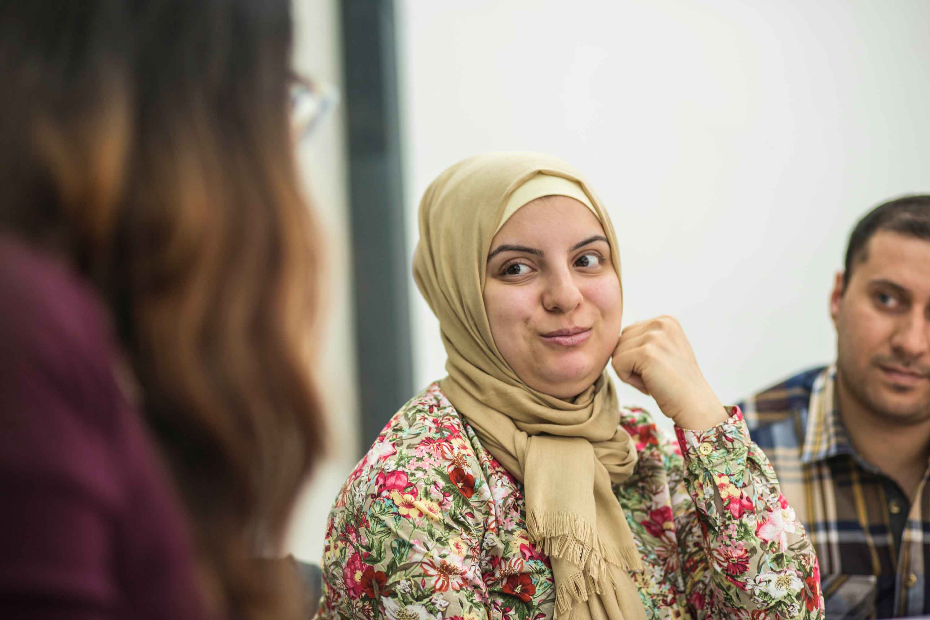 Refugees attending an ESL class at their local resettlement office