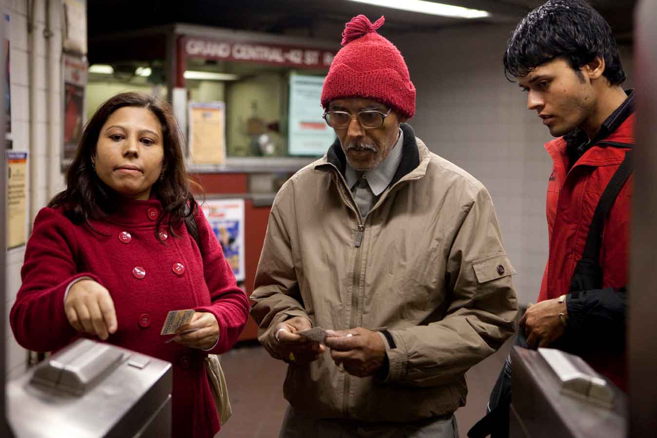 A resettled refugee family learning how to use the metro