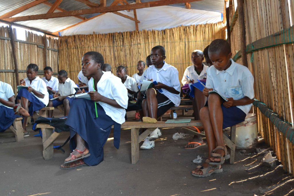 A group a Congolese children attending class in the Democratic Republic of Congo