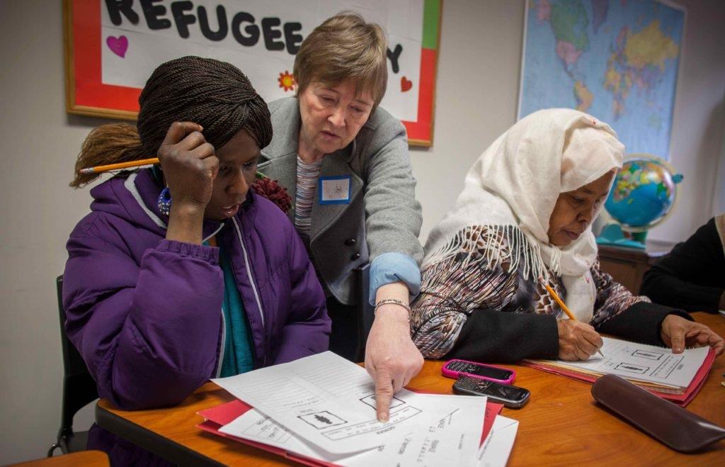 Refugees attending an ESL class at their local resettlement office. IRC/EHockstein