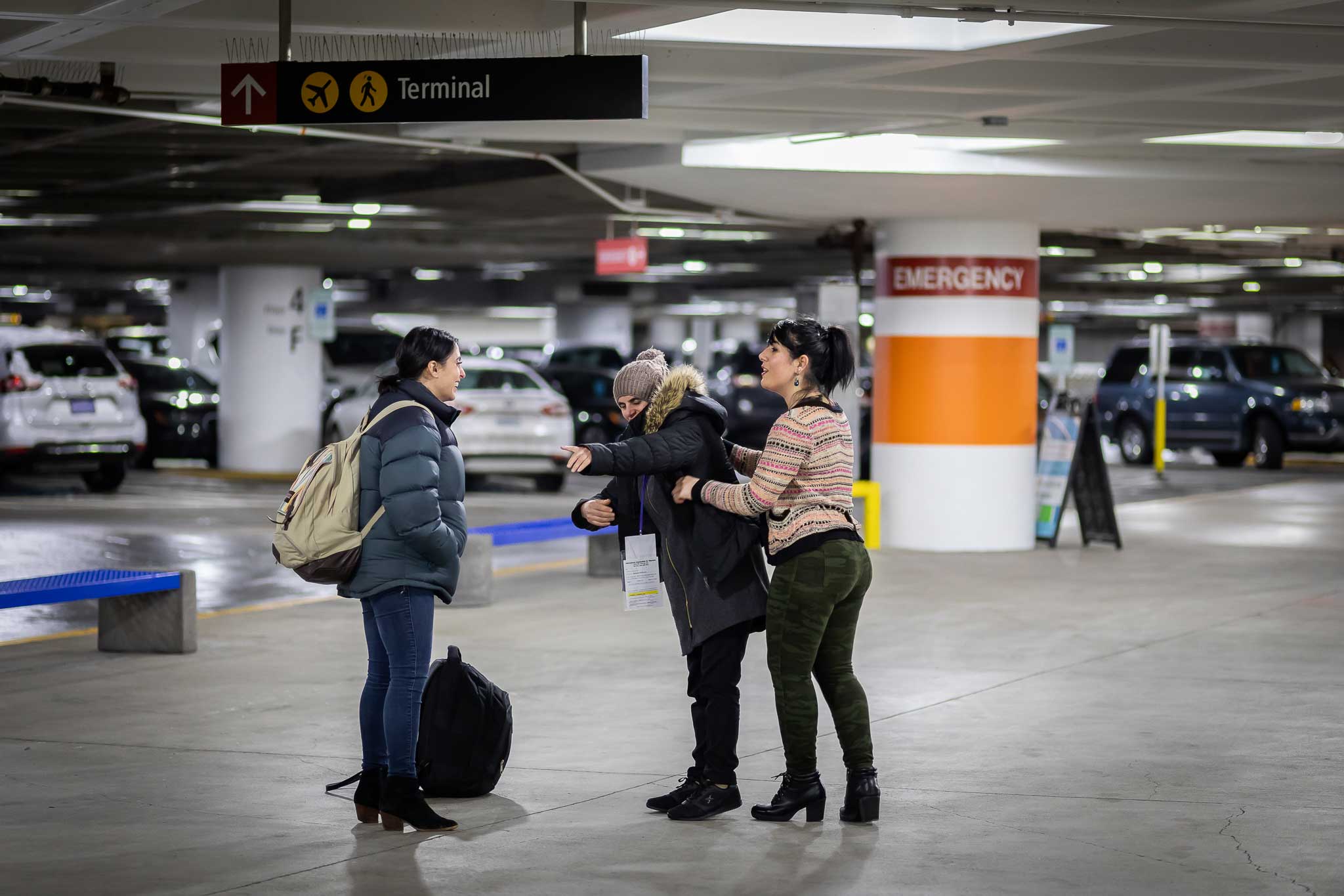 A group of recently arrived refugees navigate transportation at an airport. Photo/IRC
