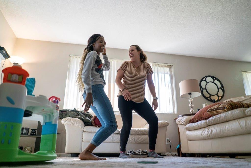 Jacqueline’s daughter, Christelle, 23, and her friend Charlee Andree, 16, dance. Jacqueline Uwumeremyi, 43, fled the Democratic Republic of Congo to South Africa in 1998 because of escalating violence. In South Africa, Jacqueline faced constant xenophobia and feared for her and her family's safety. She and her children were resettled in Boise by the IRC in October 2018. There, she was welcomed by the local church community who helped Jacqueline navigate American customs and culture. Today, Jacqueline works as an interpreter, speaking five languages, and she is now the one helping other refugees adapt to their new community.Cultural Orientation community partners and sponsors resources for community partners and sponsors